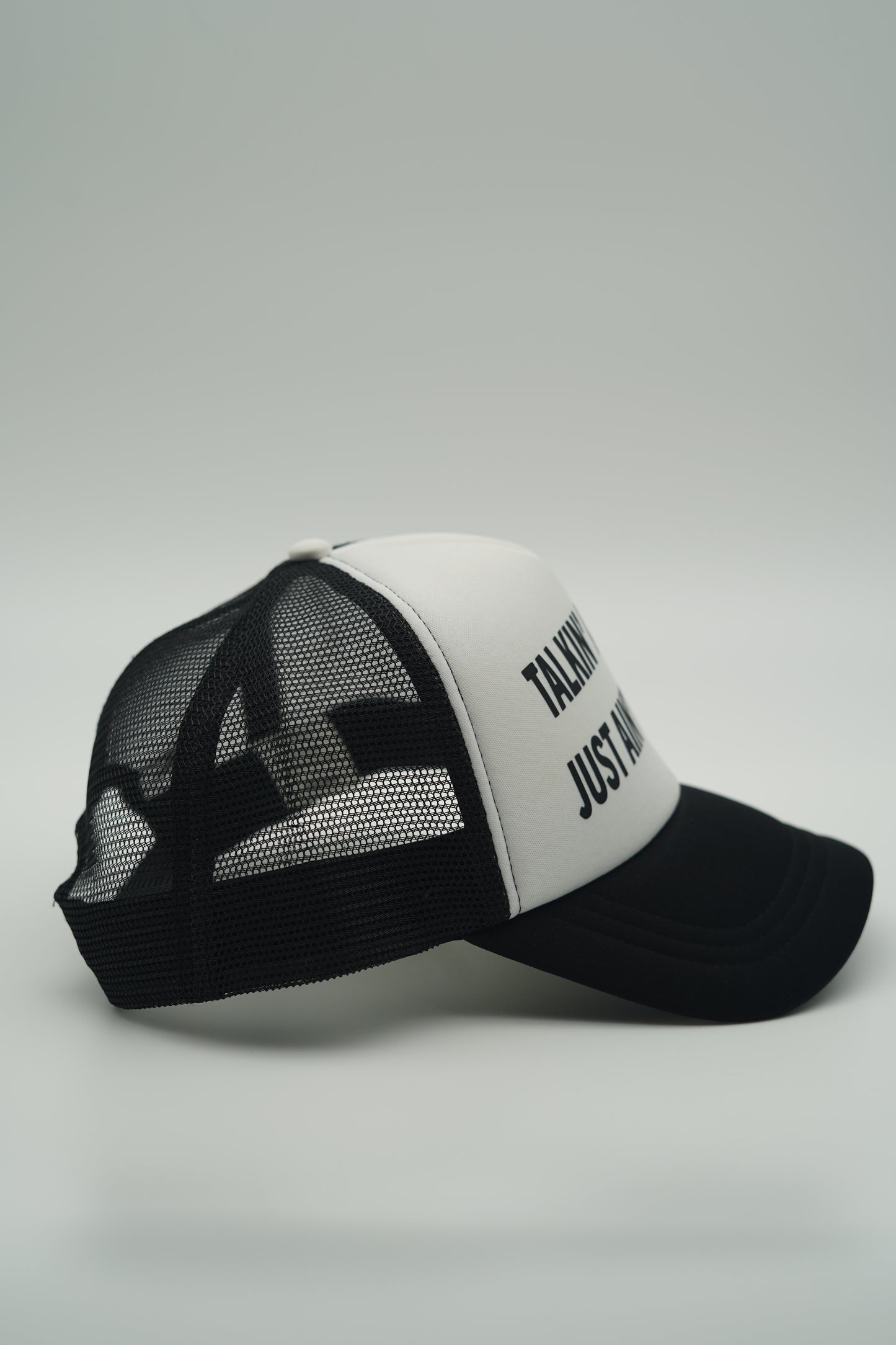 Black “The Meaning” Trucker Hat
