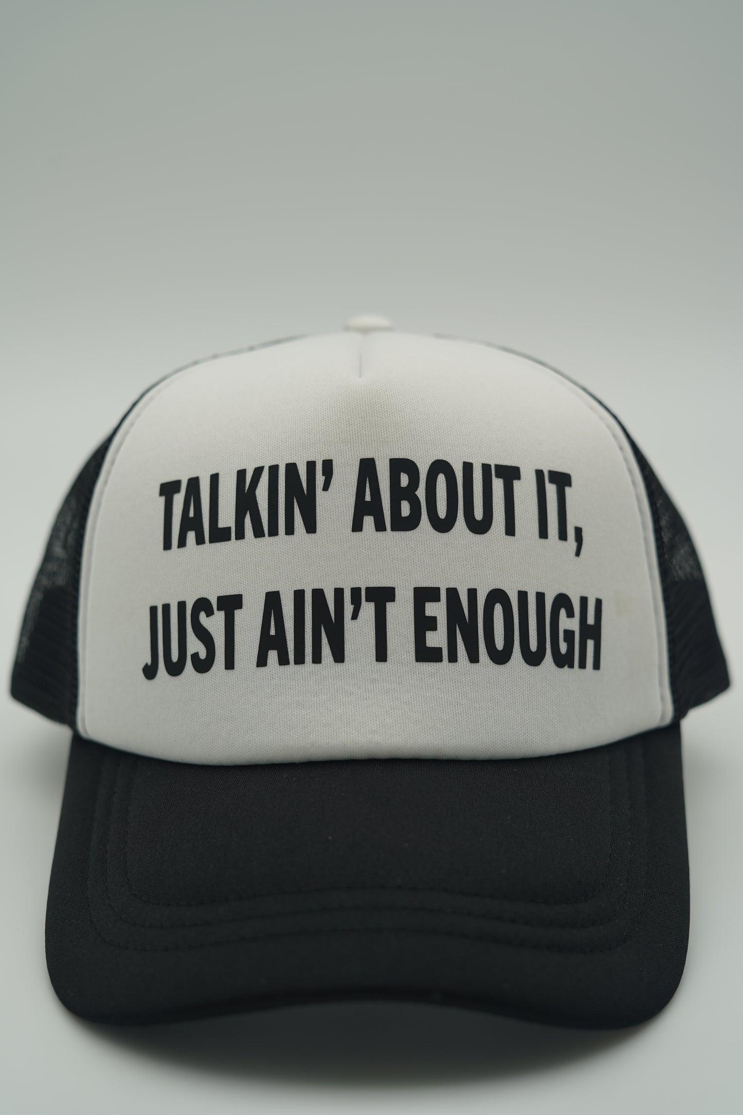 Black “The Meaning” Trucker Hat