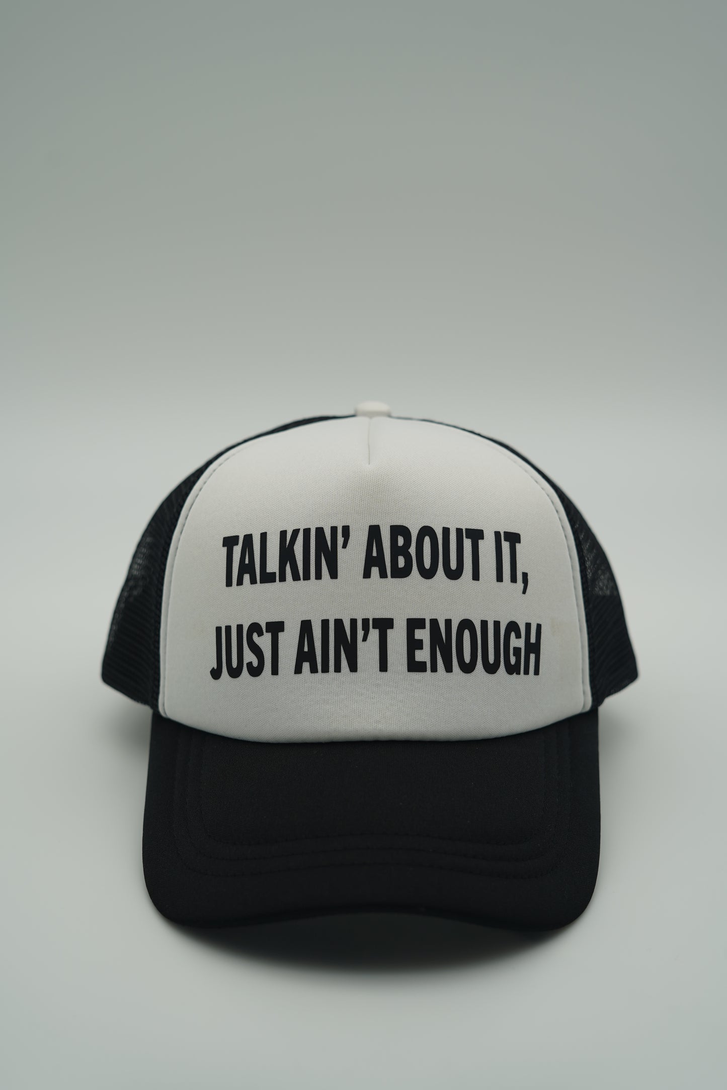 Black “The Meaning” Trucker Hat