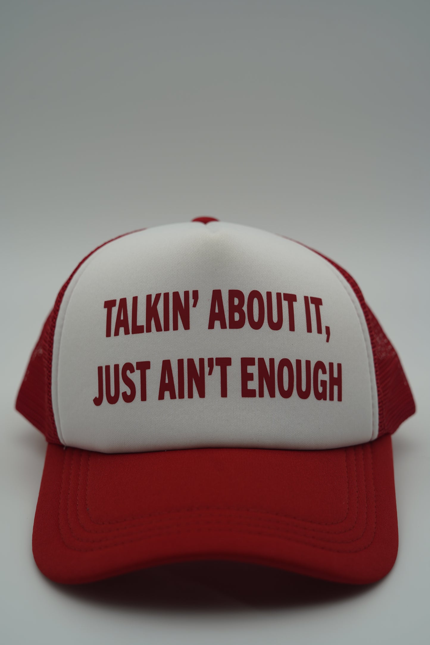 Red “The Meaning” Trucker Hat